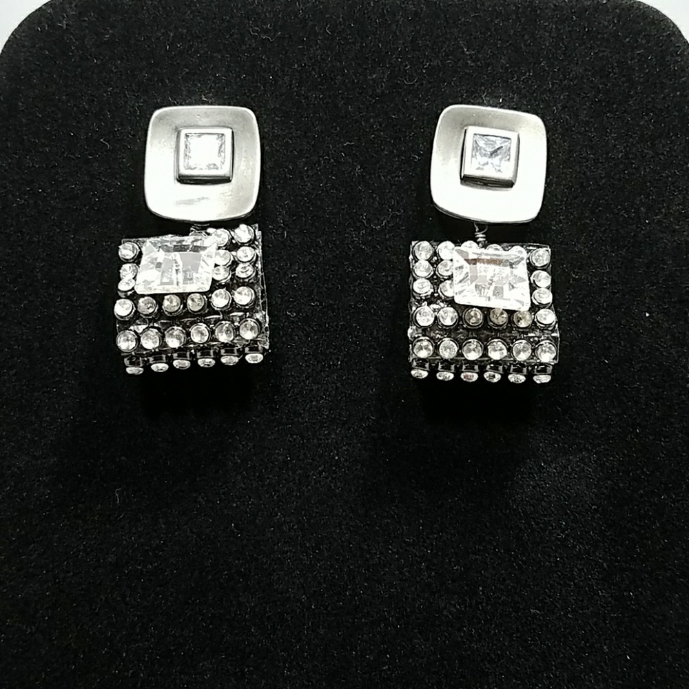 Silver metal, /crystal dangling earrings